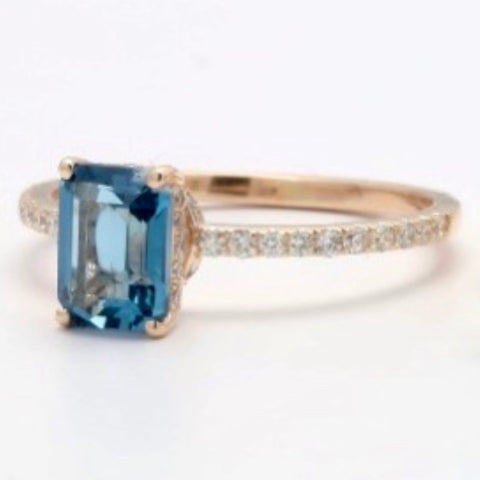 Blue topaz & diamond ring