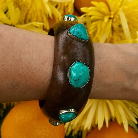 Wide wood bangle with large turquoise stones