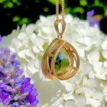 Moldavite pendant in 22k yellow gold