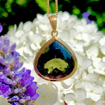 Moldavite pendant in 22k yellow gold