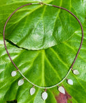 Moonstone leaf, garnet & peridot rose gold necklace