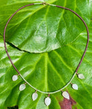 Moonstone leaf, garnet & peridot rose gold necklace