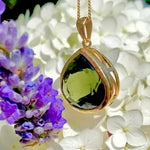 Moldavite pendant in 22k yellow gold