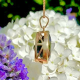 Moldavite pendant in 22k yellow gold