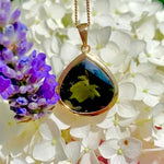 Moldavite pendant in 22k yellow gold