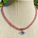 Pink sapphire & white gold, sapphire & diamond evil eye necklace