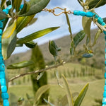 Turquoise & ruby yellow gold necklace