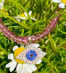 Pink sapphire & white gold, sapphire & diamond evil eye necklace