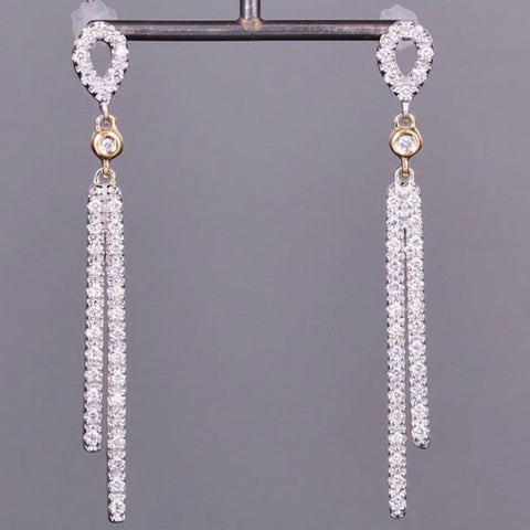 Diamond earrings in white & yellow gold