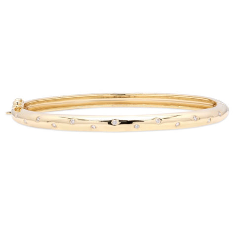 Diamond studded yellow gold bangle