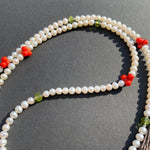 Pearl, peridot, coral & cinnabar tassel necklace