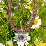 Pink sapphire & white gold, sapphire & diamond evil eye necklace