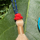 Cinnabar lotus & turquoise tassel necklace