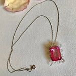 Pink topaz & diamond flame necklace