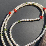 Pearl, peridot, coral & cinnabar tassel necklace