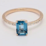 Blue topaz & diamond ring