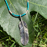 Turquoise feather necklace